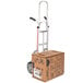 A Magliner hand truck with a box on it.