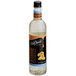 A bottle of DaVinci Gourmet Sugar Free Macadamia Nut flavoring syrup.