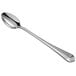 a silver spoon on a white background