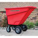 a red cart on wheels