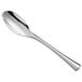 a silver spoon on a white background