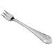 a silver fork on a white background