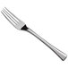 A close-up of a Reserve by Libbey stainless steel dinner fork with a silver handle.