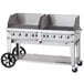 a grill with wheels and a lid