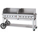 a large grill with a cart