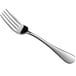 An Acopa Vernon stainless steel dinner fork with a silver handle.