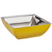 a yellow bowl with silver trim