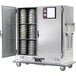 A Metro stainless steel heated banquet cabinet with two open doors.