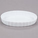 A white fluted oval CAC serving dish.
