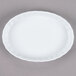 A white fluted oval CAC serving dish.
