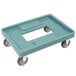 A slate blue plastic dolly with wheels.