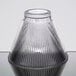 A Sterno clear glass lamp shade with a pleated design.