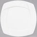 A CAC Garden State bone white square porcelain plate with a wavy design on the edge.