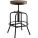 A Lancaster Table & Seating black barstool with a wood seat and metal base.