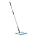 A Lavex blue microfiber spray mop with blue cloth pads.