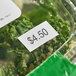 A plastic container with a Garvey white label that says $5.
