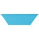 A blue rectangular Keywest melamine bowl with white edges.