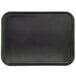 A black Dinex Glasteel fiberglass tray with a white border.