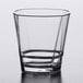 A clear Libbey Infinium Torque plastic rocks glass.