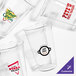A group of clear Fabri-Kal Greenware plastic cups with a logo on one.