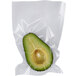 an avocado wrapped in plastic