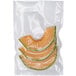 A close up of a bag of sliced watermelon in a Breville commercial vacuum bag.