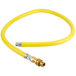 a yellow hose with a metal connector