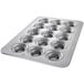 A Chicago Metallic Jumbo Crown Muffin Pan with 15 holes.