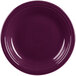 A close-up of a purple Fiesta® dinner plate with a rim.