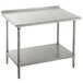 An Advance Tabco stainless steel work table with a galvanized undershelf.