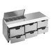 A Beverage-Air stainless steel refrigerated sandwich prep table with drawers and clear lids.