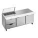 A Beverage-Air stainless steel sandwich prep table with clear lids over two drawers.