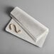 A stack of white Toddy commercial cold brew paper filters.