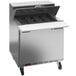 A Beverage-Air stainless steel refrigerated sandwich prep table on wheels.