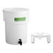 A white 5-gallon Toddy commercial cold brew system with a spigot and a separate plastic lift stand.