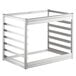 A Regency wall mounted sheet pan rack with metal shelves and metal bars.