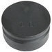 A black round weight with the text "4 lb." on it.