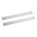 A pair of white metal pan slides.
