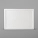 A white rectangular Tuxton AlumaTux china plate.