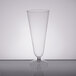 A clear plastic WNA Comet Pilsner cup with a stem on a table.