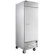 A silver Beverage-Air reach-in freezer with a handle on wheels.