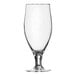An Arcoroc stemmed pilsner glass with a clear bottom.