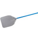 A stainless steel pizza peel with a blue handle.