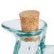 A Tablecraft Marbella oil & vinegar cruet with a cork in it.