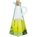 A Tablecraft glass oil & vinegar cruet with a cork in it.