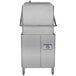 A stainless steel Jackson DynaStar door type dishwasher with a handle.