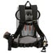 A ProTeam backpack vacuum with a tool kit attached to it.
