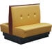 A yellow and black American Tables & Seating double booth.