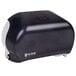 A black San Jamar Versatwin double roll toilet paper dispenser on a white background.