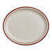 A white platter with a brown rim.